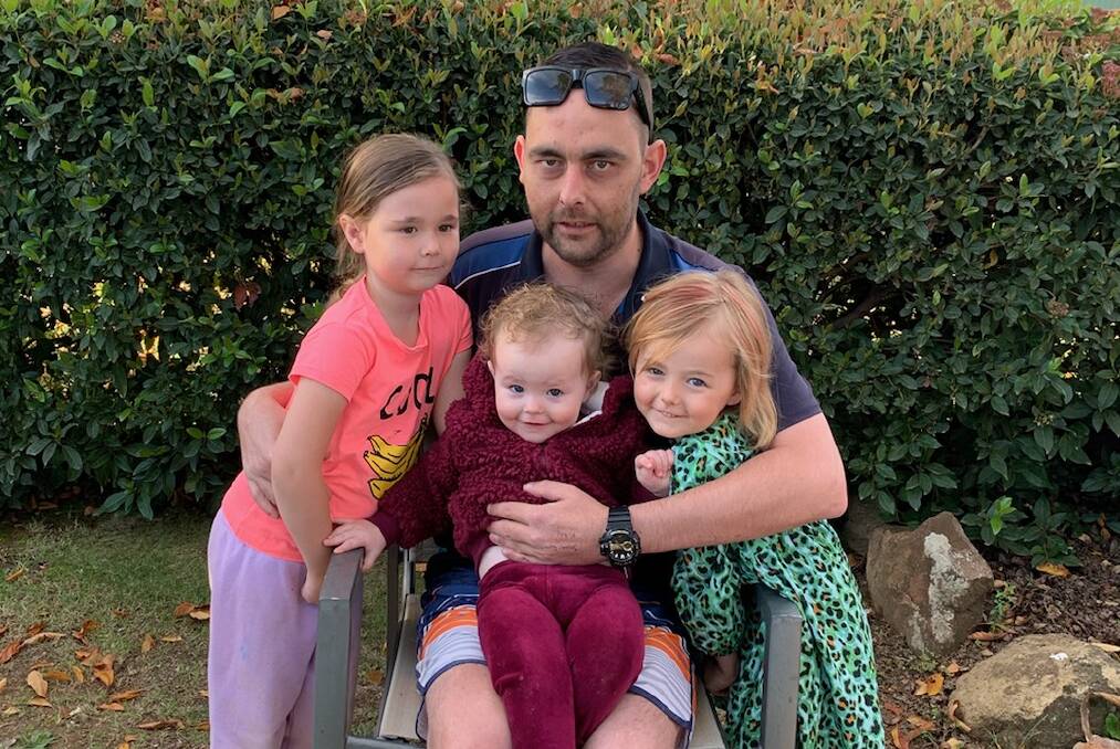 CANCER FIGHT: Josh Patterson with his daughters Shiralea, Harper and Kalaree. Mr Patterson is fighting a rare type of blood cancer. Photo: SUPPLIED