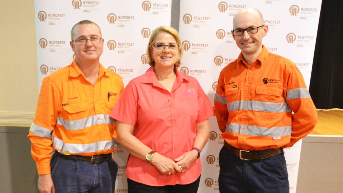 SUPPORTING WOMEN'S HEALTH: Cadia geologists Evan Ross and Luke Barbetti with McGrath Foundation breast cancer nurse Sue Kuter (centre). Photo: SUPPLIED. 