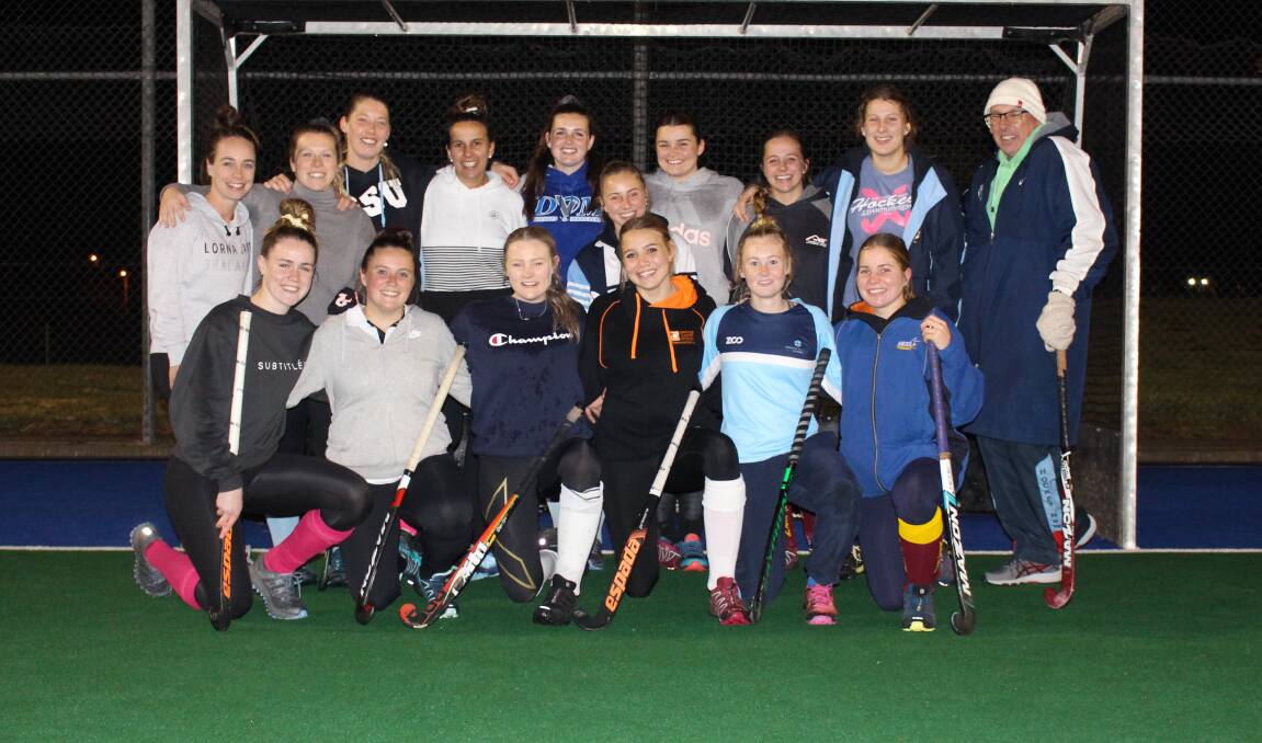HAPPY CAMPERS: Orange CYMS are ready to go in this weekend's Premier League Hockey grand final. Photo: MAX STAINKAMPH