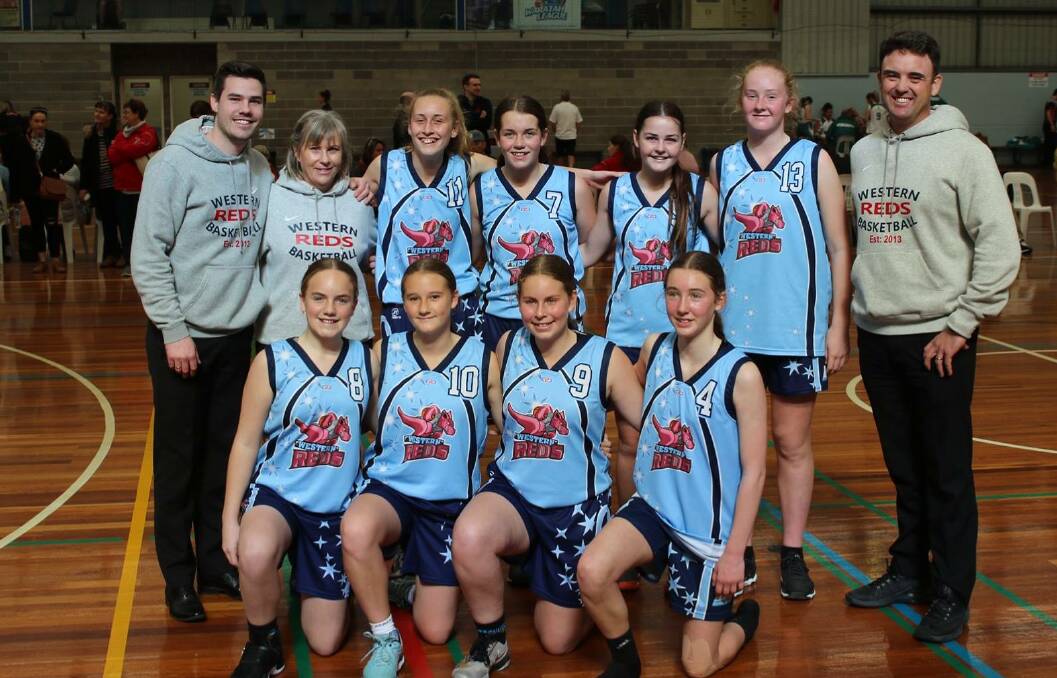 CHALLENGERS: Kieran Purvis (far left) with Western Reds players Olivia Hopper, Katelyn Johnson, Lani Wall, Alexandria Oliver and (front) Sam Harvey, Marnie Grintell, Lara Winterton and Bridie White. Photo: SUPPLIED.