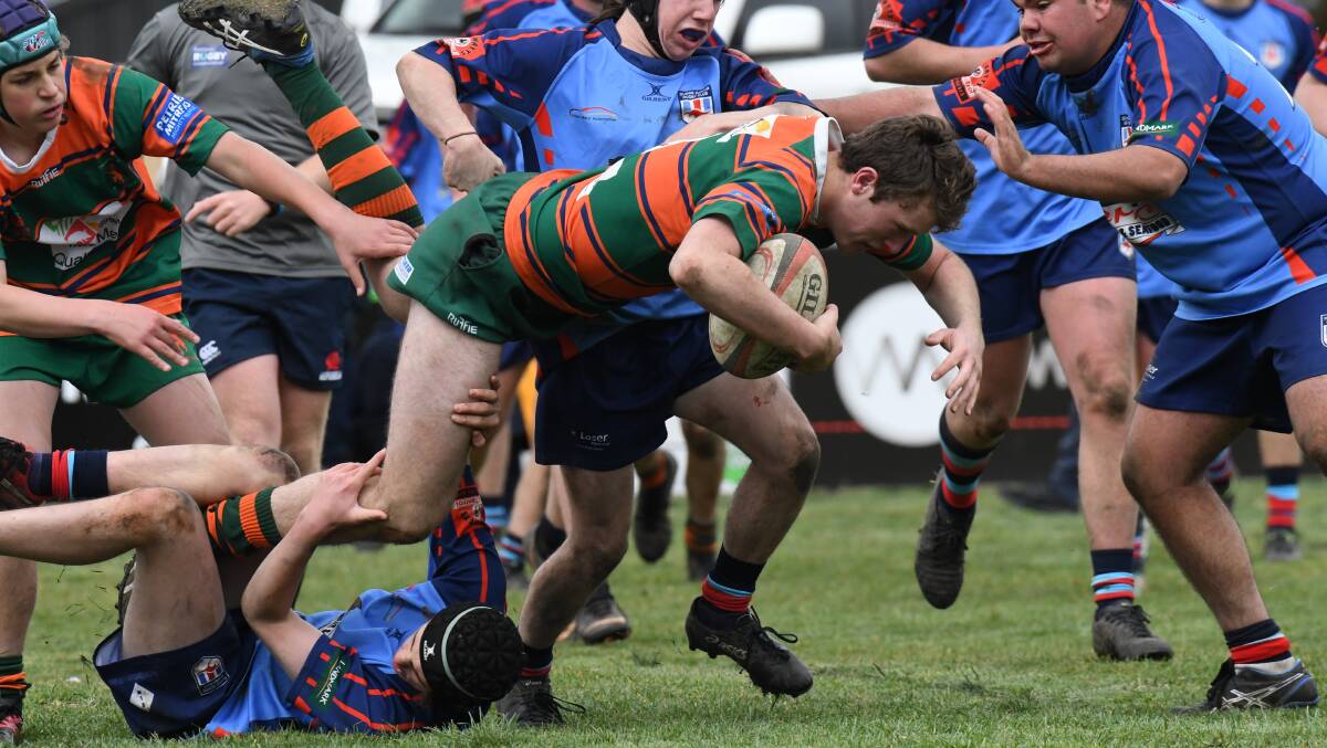 All the action from Pride Park in the under 17s grand final between Orange City and Dubbo Kangaroos. Photos: JUDE KEOGH