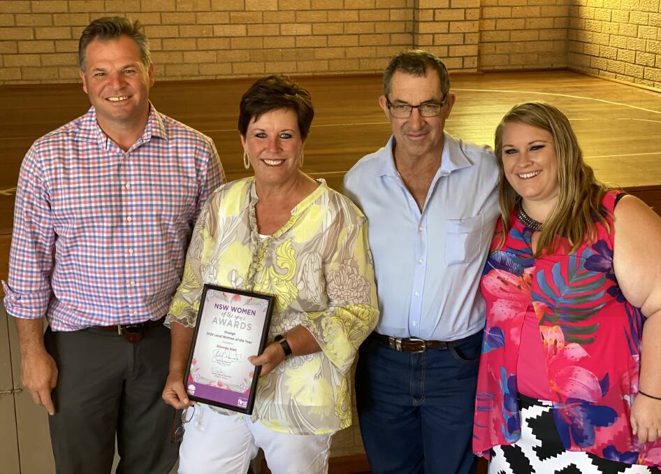 Phil Donato with Woman of the Year Rhonda Watt, who was alongside her husband Andrew and daughter Joanna on Monday. Photo: SUPPLIED.