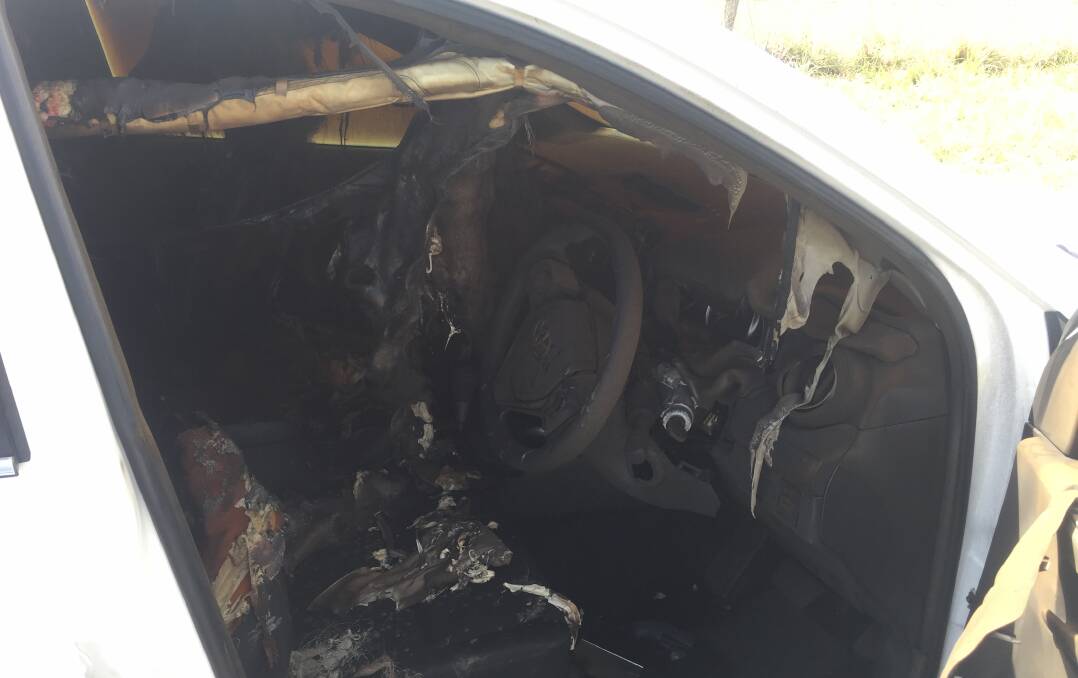 The photos of the car gutted by fire on Saturday morning.