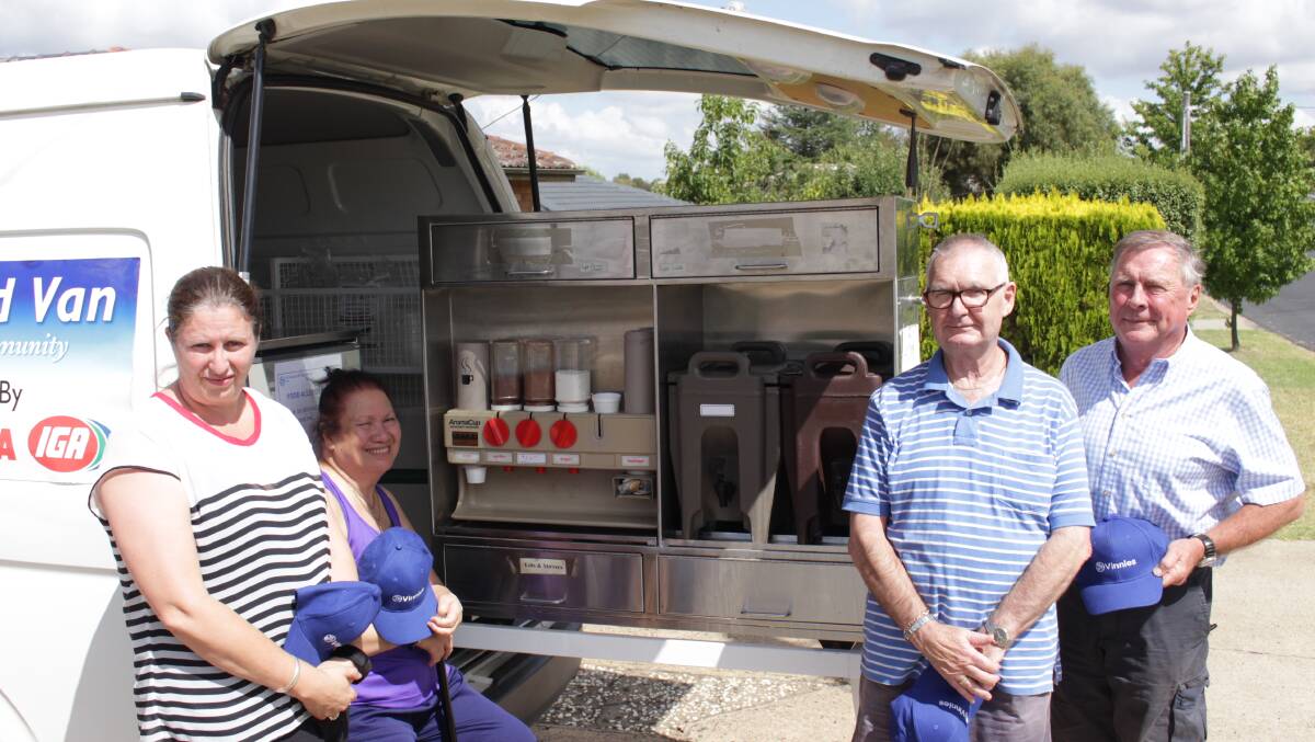 FEEDING THE HUNGRY: St Vincent de Paul's Karen Fewster, Rosie Frecklington, Barry Frecklington and Chris Lennon with the current food van. Photo: MAX STAINKAMPH.