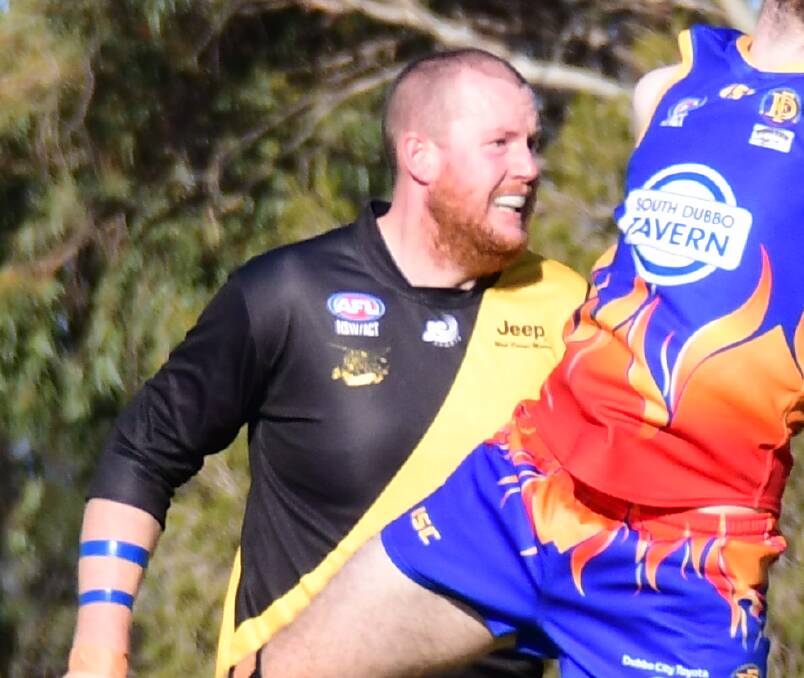 FIRED UP: Andrew Nelson, picture playing in 2019, has called for the AFL Central West to scrap plans to move down to 16-a-side in first grade. Photo: AMY McINTYRE