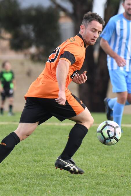 DOWN: Jono McCann's Millthorpe Tigers had a weekend to forget as they went down to Barnies United on home deck. Photo: JUDE KEOGH
