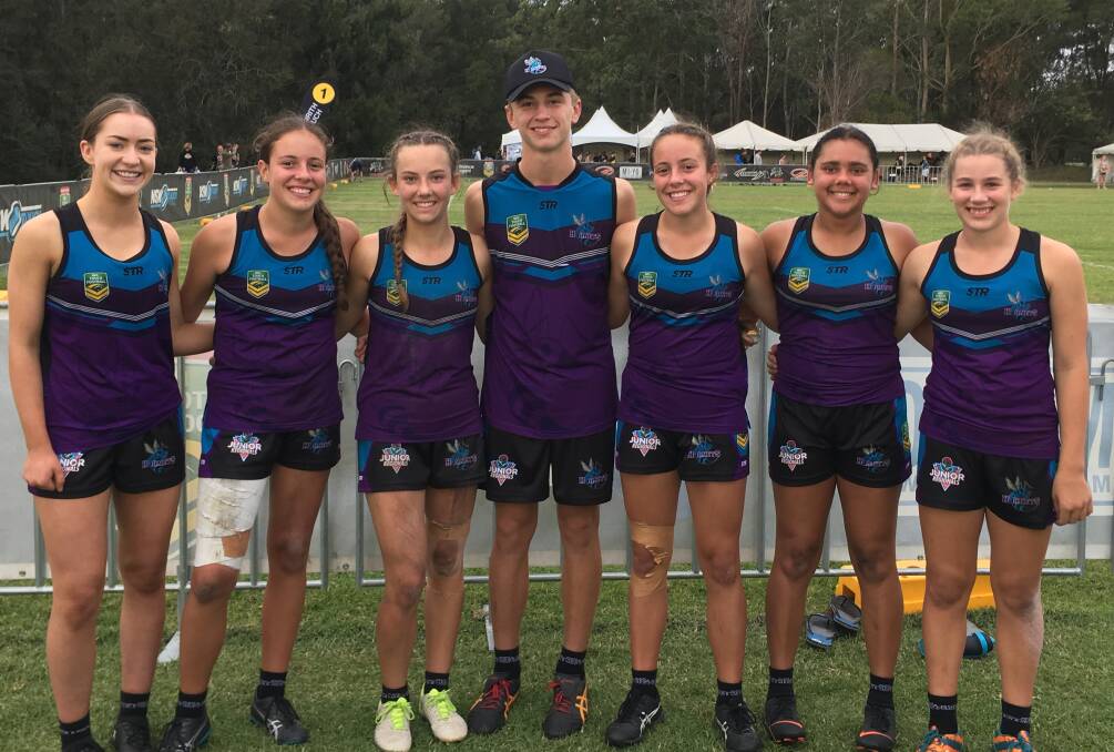 BACK AGAIN: Tayla Kaufman, Hailey Prestwidge, Sophie Banks, Jack Cole, Caitlin Prestwidge, Savannah Moore, Josie Clark in Hornets' colours last year. All aside from Kaufman will have the chance to make the 2019 squad. Photo: SUPPLIED. 