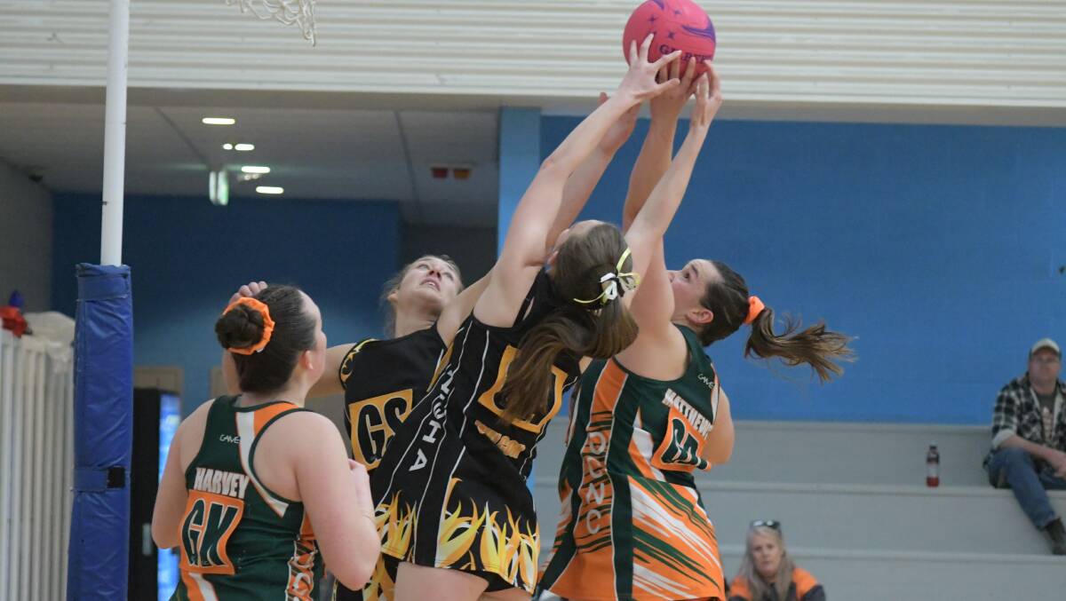 INTENSE: All the action from the Orange Netball Association grand final on Saturday. Photos: JUDE KEOGH