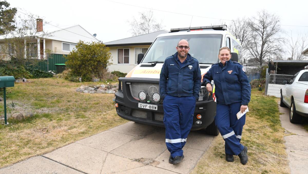 'HEROES': Carl Bevan and Joanne Ninness in Rachel Campbell's driveway on Friday. Photo: JUDE KEOGH. 