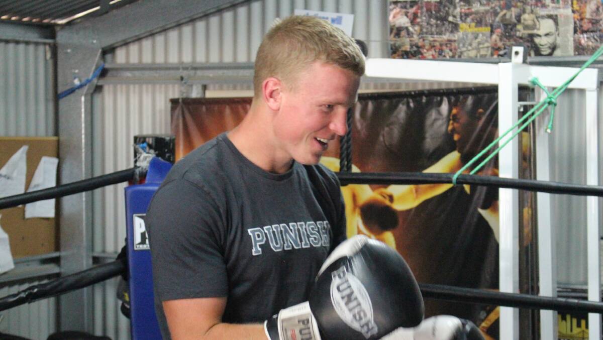 IN FORM: Charlie Bubb sparring before his fight. He battled a broken nose to claim victory. Photo: MAX STAINKAMPH