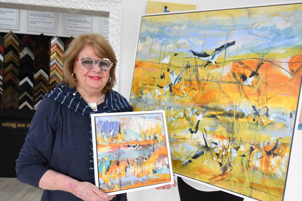 BACK ON SHOW: Orange artist Rhonda Campbell with some of her artwork which is part of her exhibition 'Notes from the Wetlands'. Photo: JUDE KEOGH