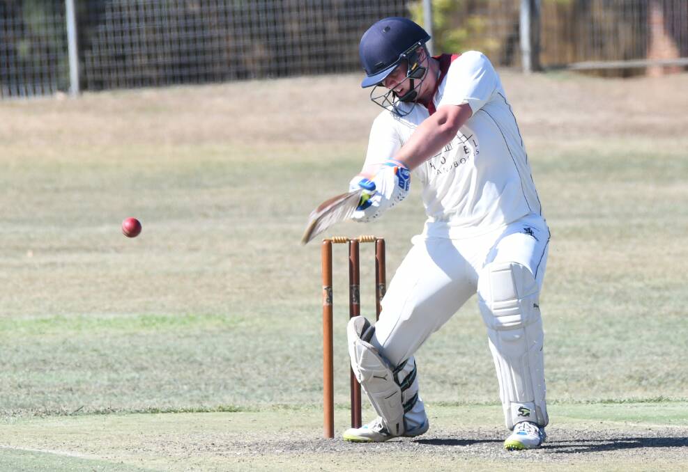 WHACK: Cavaliers' Kaleb Cook cuts at a wide ball on Bathurst's George Park on Saturday on his way to a mammoth 151 not out. Photo: CHRIS SEABROOK. 