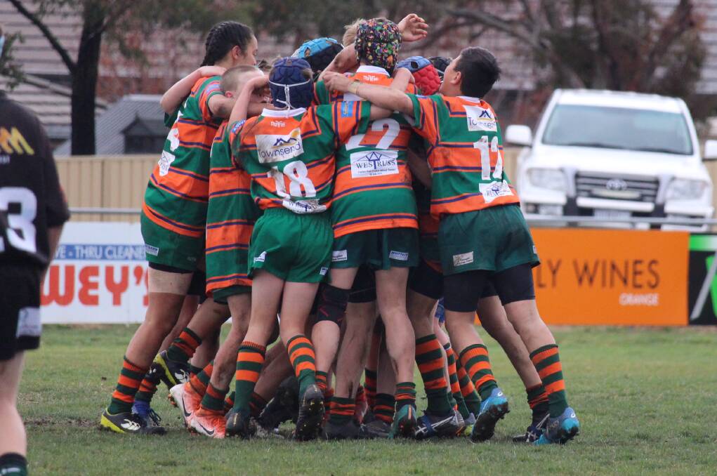 FINAL CHAMPIONS: Orange City celebrate winning the 2019 CWJRU under 13 grand final in August. The under 13 competition will become under 12s and 14s in 2020. Photo: MAX STAINKAMPH