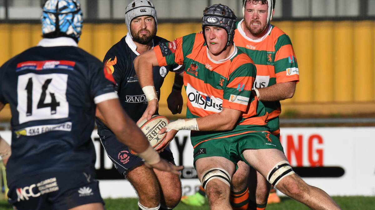 PASS OFF: Fletcher Rose has loved being in orange and green in 2019 after returning from Kinross. Photo: JUDE KEOGH