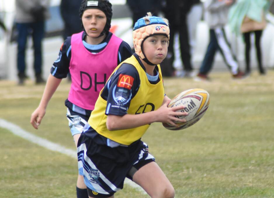 Harry Greenhalgh looks to direct traffic for Bloomfield Tigers during the under-12s semi-final win over Bathurst in 2018. Photo: MARK LOGAN. 
