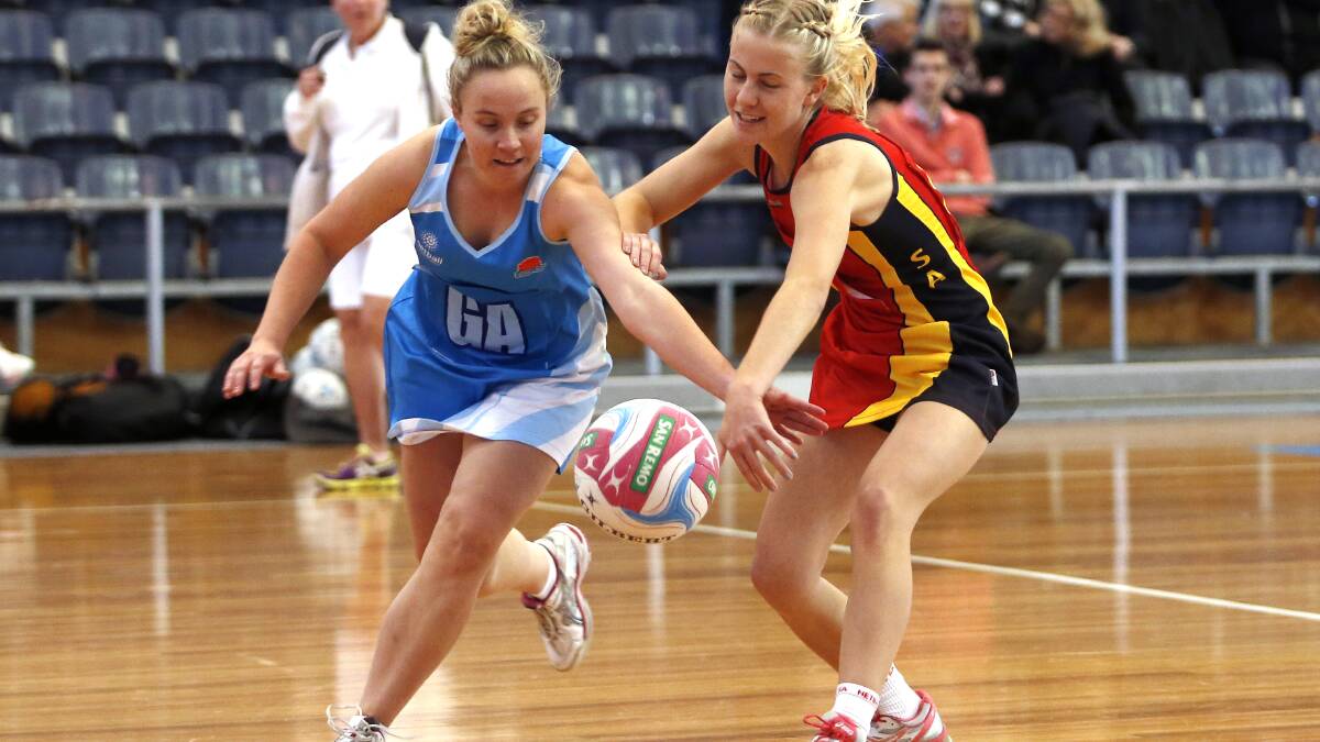 ANOTHER VICTORY: Eliza Mills (left) at the Marie Little Shield in 2015. Photo: Dave Callow/Netball Australia
