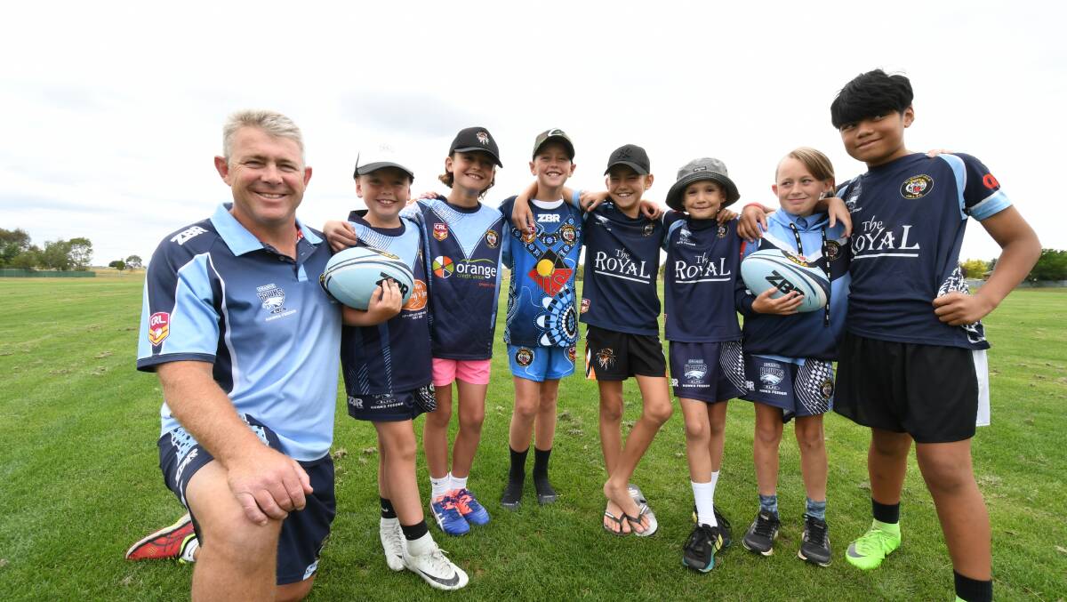 Jason Greenhalgh with some of the club's juniors in early 2018. 
