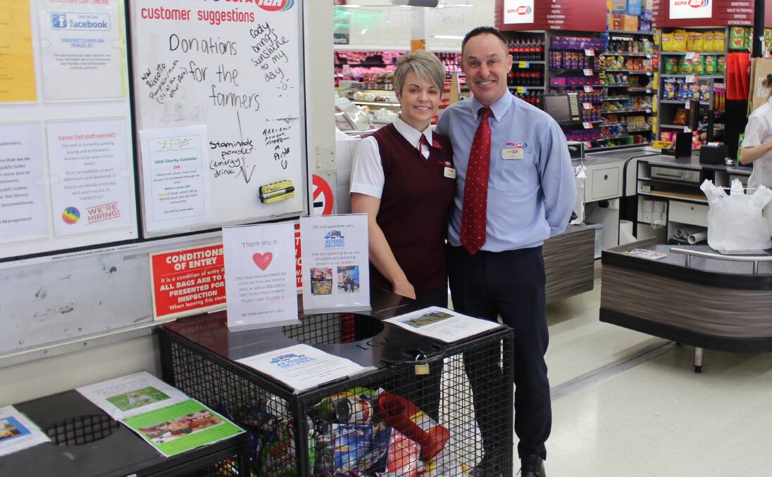 HAPPY HELPERS: Rochelle and Ian Ashcroft at Ashcroft's IGA on Piesley Street. Photo: MAX STAINKAMPH