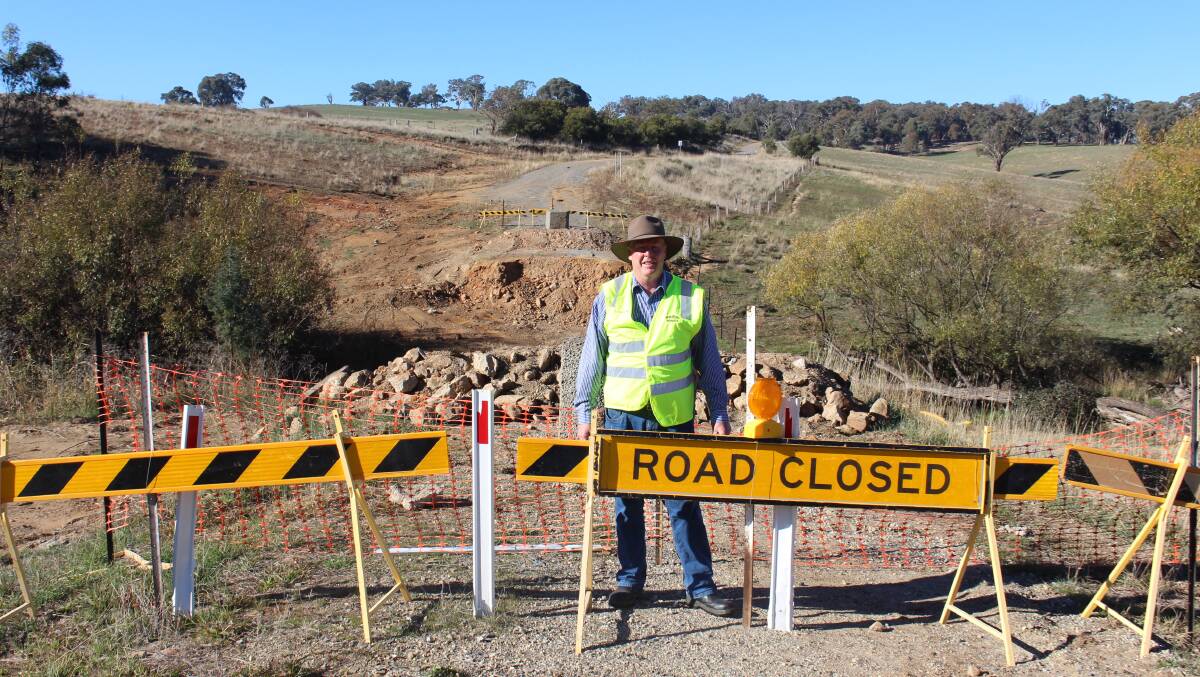 TO BE REOPENED?: Councillor Bruce Reynolds in front of the former Carcoar Street bridge. Photo: MAX STAINKAMPH