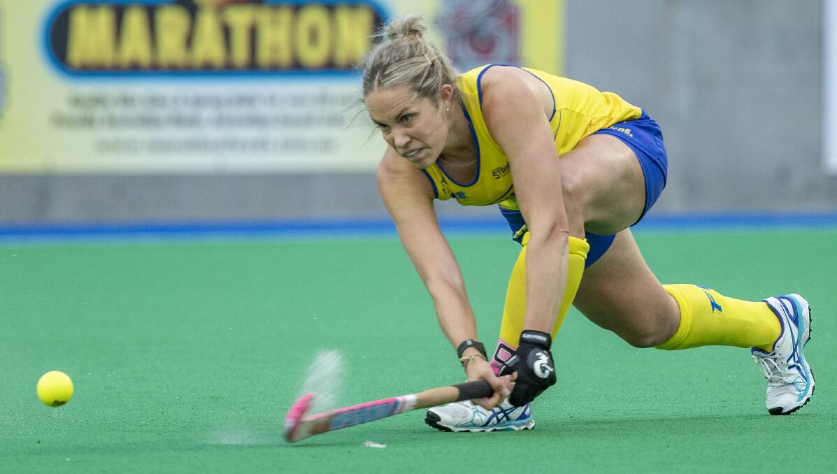 READY FOR FINALS: Canberra Strikers captain Eddie Bone hits out for the Hockeyroos earlier this year. Photo: Hockey Australia/Click In Focus