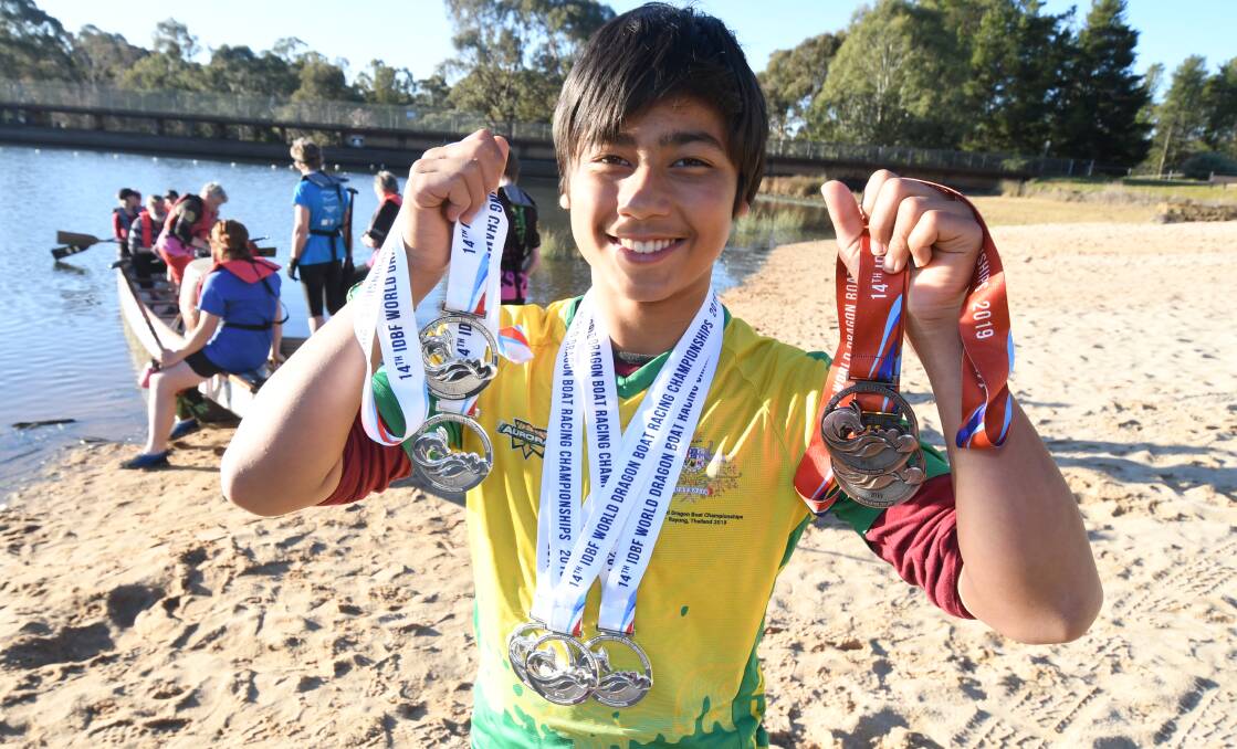 BIG HAUL: Isaac Sewak with his seven medals from Thailand. Photo: JUDE KEOGH
