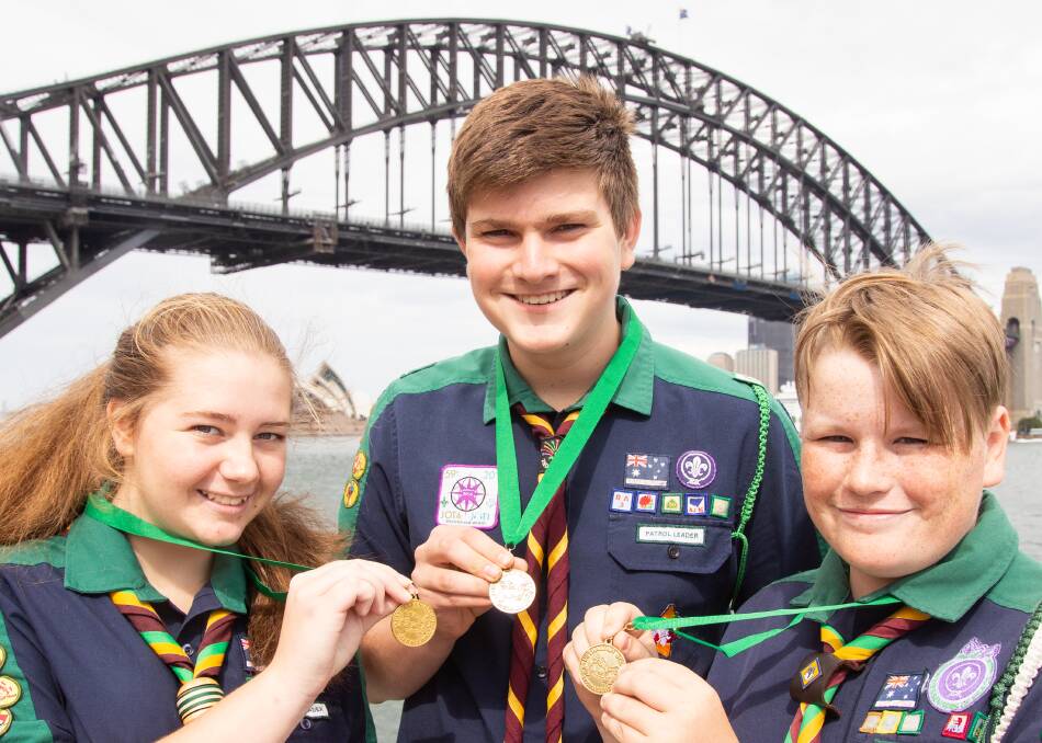 STATE'S TOP SCOUTS: Orange scouts Liddian Selwood, Joe Spencer, Thomas Mackenzie receiving the top award in the state in Sydney on Sunday. Photo: SUPPLIED. 