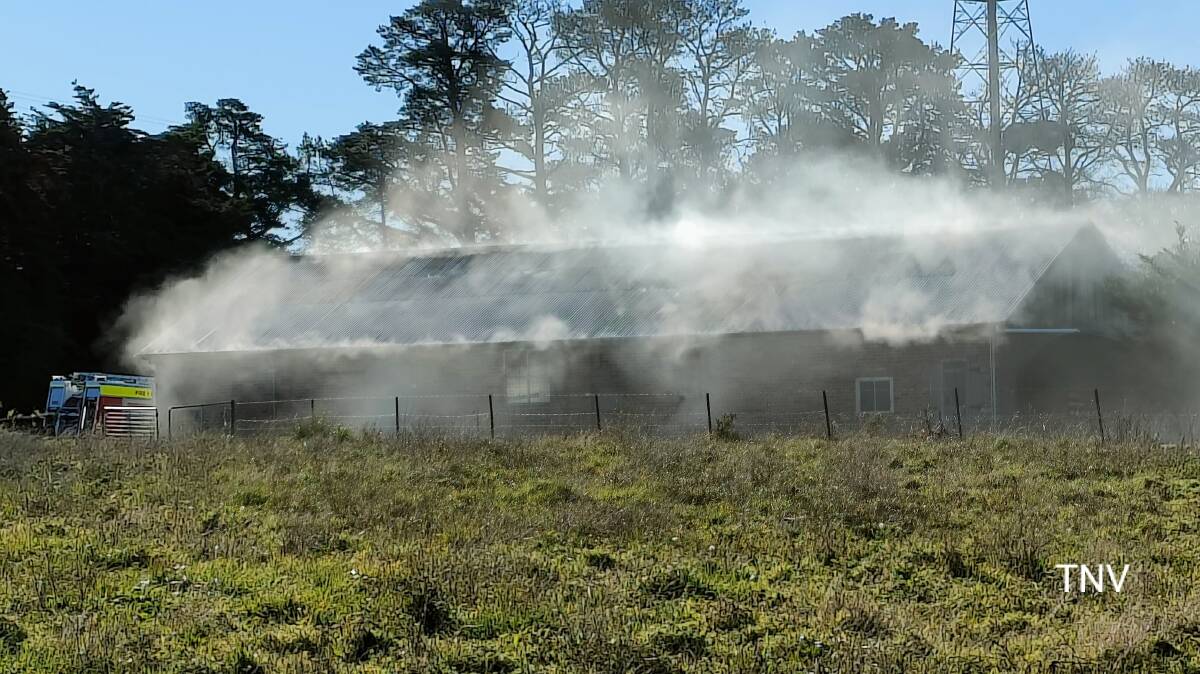 SHED FIRE: The Rural Fire Service was called to a blaze on Canobolas Road on Thursday. Photo: TROY PERSON/TOP NOTCH VIDEO
