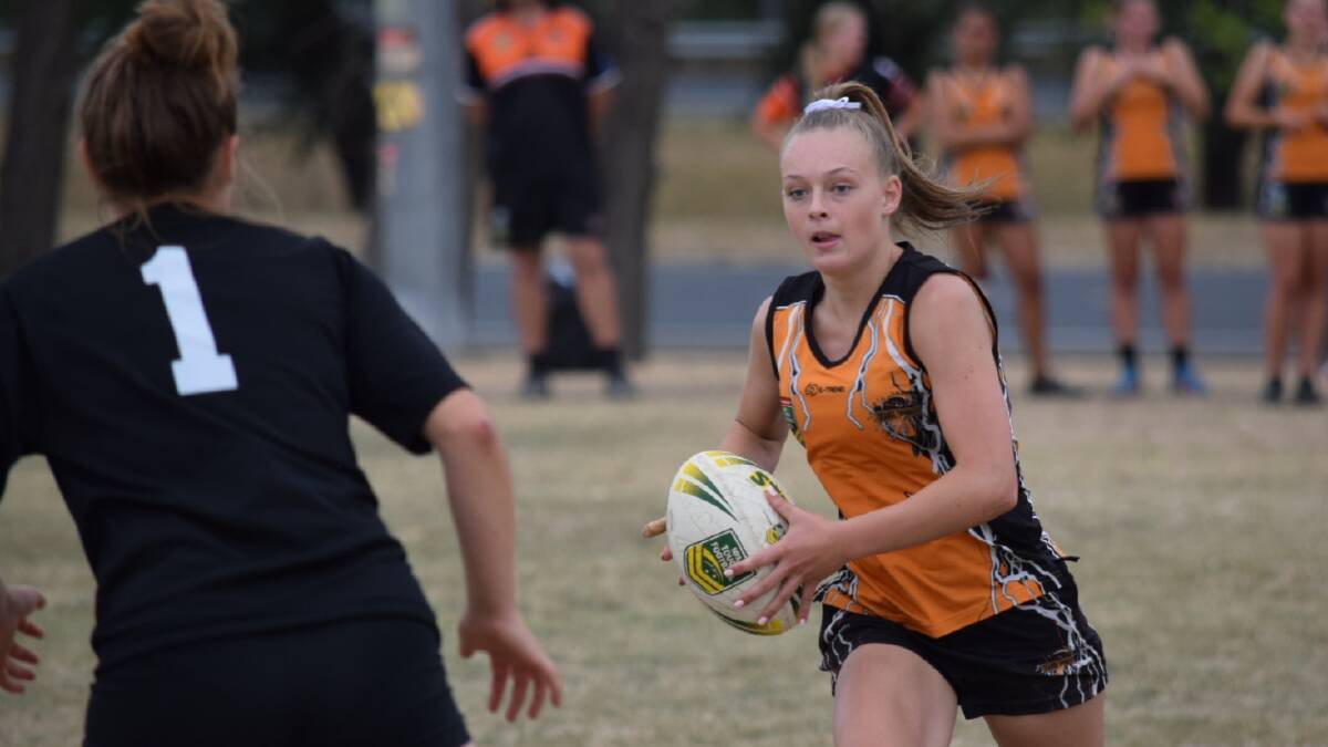 ON THE MOVE: Hope Gibson has her eyes on the try line in Canberra. Photo: SUPPLIED. 