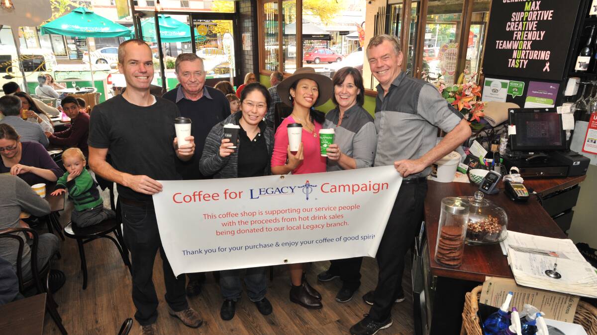 CAFE SUPPORT: Nick Gleeson from Factory Espresso, Bob Garvin from Legacy, Winnie Tan from The Mills Cafe, Ruby Gleeson from Factory Espresso with Susie and Max Glasby from Scrumptious taken before Anzac Day in 2017. Photo: JUDE KEOGH