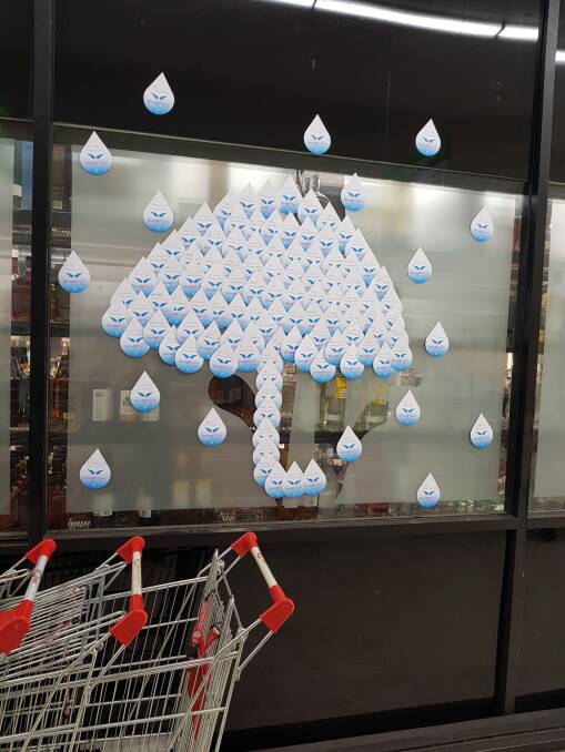 Drought stickers in the shape of raindrops. 