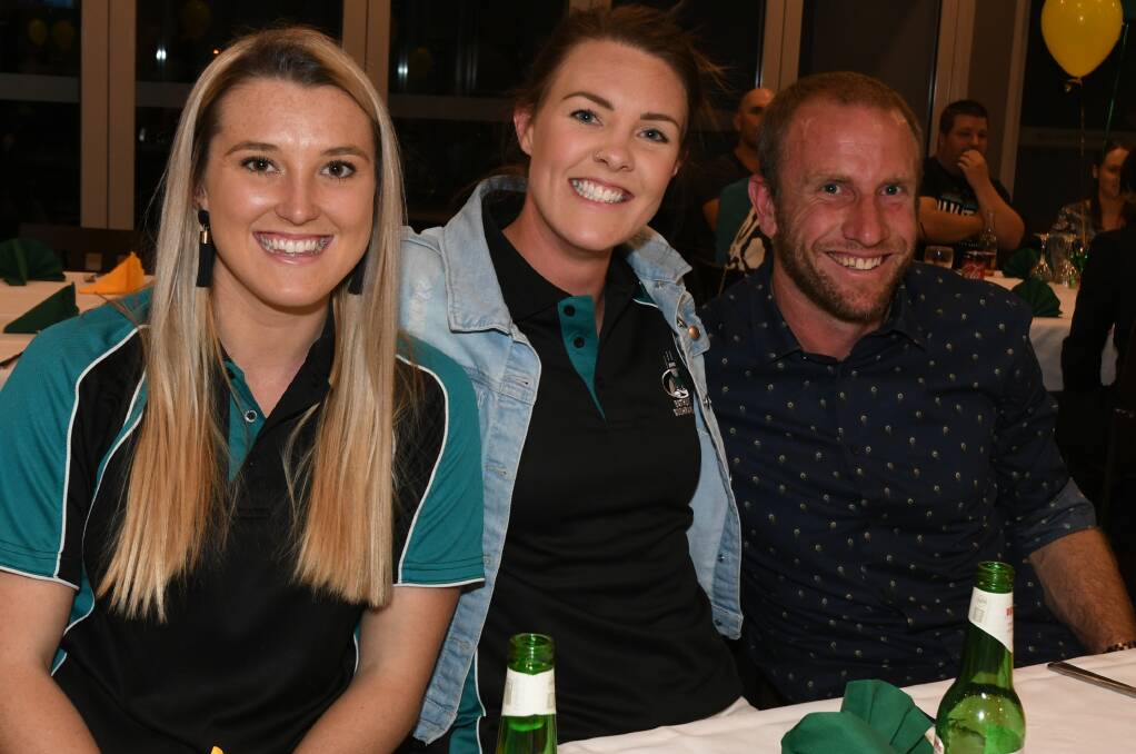 STAR: Donalee Delahunty (left) was the CWAFL women's best and fairest, sitting alongside teammate Sarah Shackleton and coach Peter Neve. Photo: JUDE KEOGH