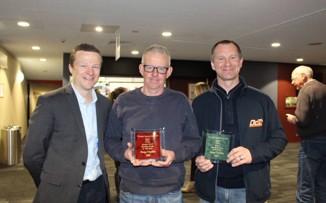 TEAM OF THE YEAR: Orange Triathlon Club president David Hunter with club stalwarts Phil Tudor and Mick Lockyer on Wednesday. Photo: MAX STAINKAMPH 
