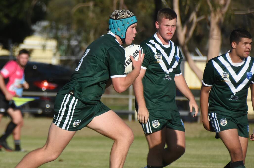 ON THE RUN: Lachie Large with ball in hand in Forbes last weekend. Photo: RENEE POWELL.