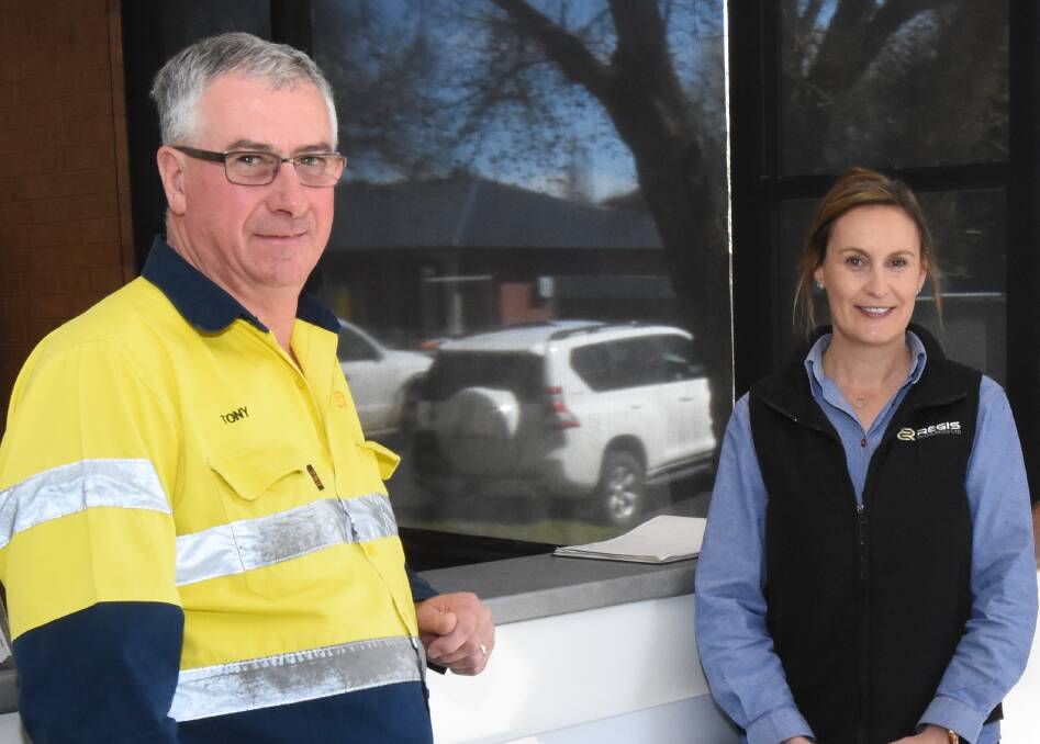 FORGING AHEAD: Regis Resources' Tony McPaul and Stacey McFawn in their Adelaide Street office in Blayney. Photo: MARK LOGAN. 
