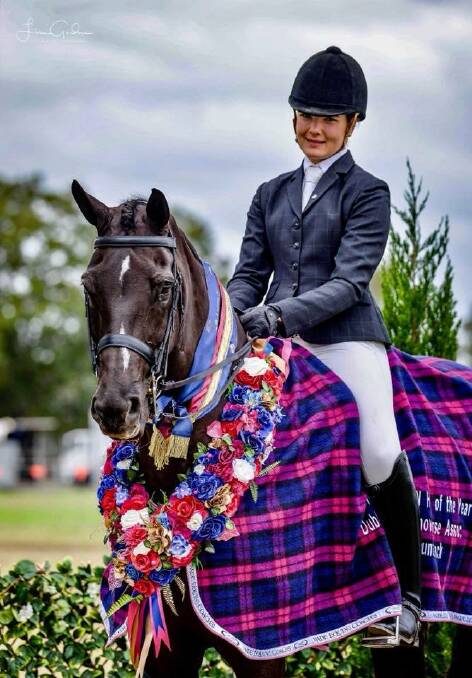 ON TOP OF THE GAME: Sophia Redenbach and Jermyn Street after winning 2018 NSW Champion Large Show Hunter of the Year. Photo: LISA GORDON. 