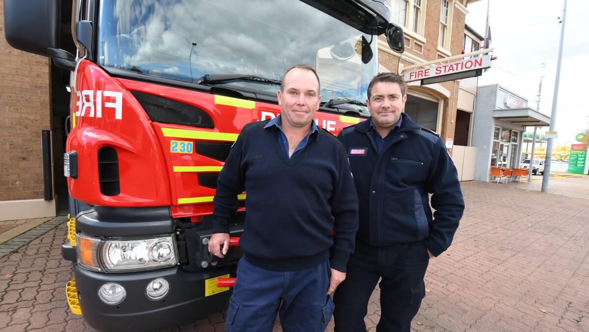 FIRE: Rob Buesnel and Mal Bird out the front of the Orange Fire Station. Photo: JUDE KEOGH