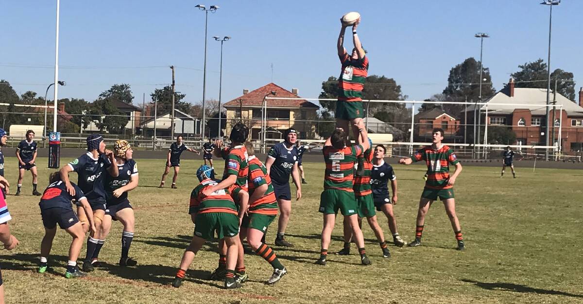 FLYING HIGH: Archie Sippel takes the line-in for Orange City during last week's minor semi-final win. Photo: JAYNE WEST. 