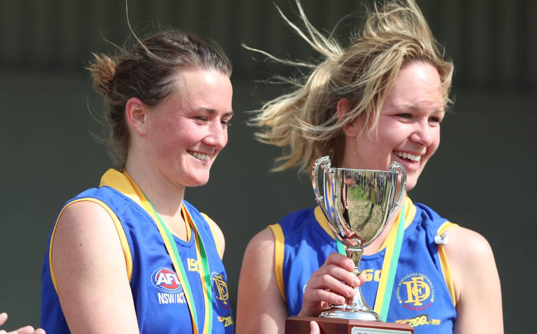 GRINNING: Emily Warner holding the trophy for the Dubbo Demons in 2018. Photo: PHIL BLATCH