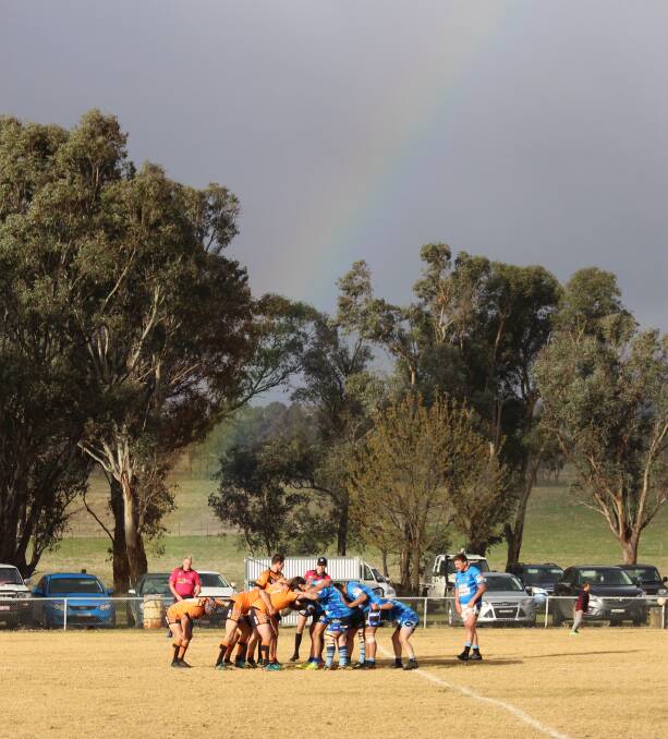 POT OF POINTS: The rainbow over the scrum in Cargo on Saturday. Photo: MAX STAINKAMPH