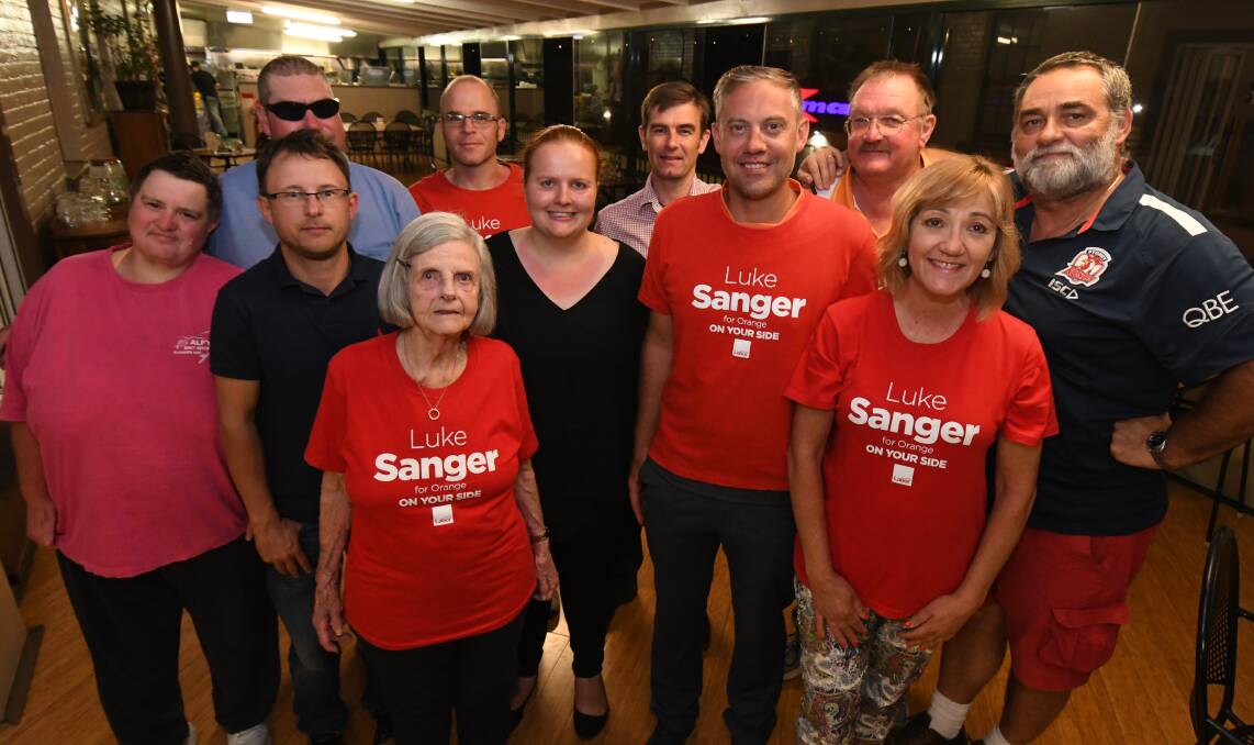 THANKED: Labor candidate Like Sanger (centre right) with his supporters at their election afterparty on Saturday. Photo: JUDE KEOGH