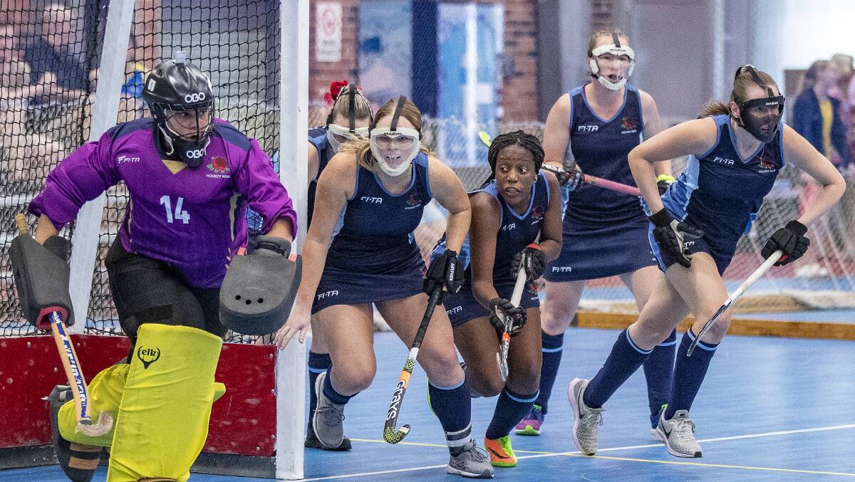 DEFENDING: Chloe Barrett (second from left) and her NSW Blues teammates defending a corner at the Hockey Australia 2020 Open Women's Indoor Championship. Photo: HOCKEY AUSTRALIA/CLICK IN FOCUS