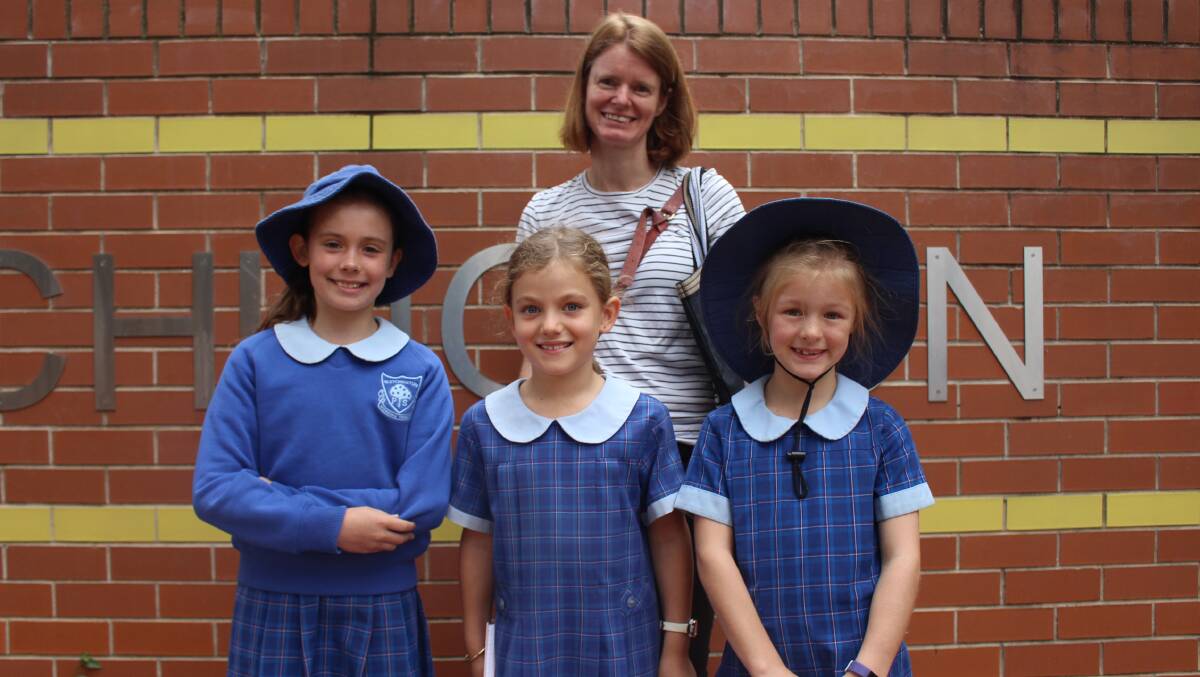 BIG SMILES: Skye Baines with students Dru Willis, Lola Majes and Georgie Baines at Bletchington Public School. Photo: MAX STAINKAMPH