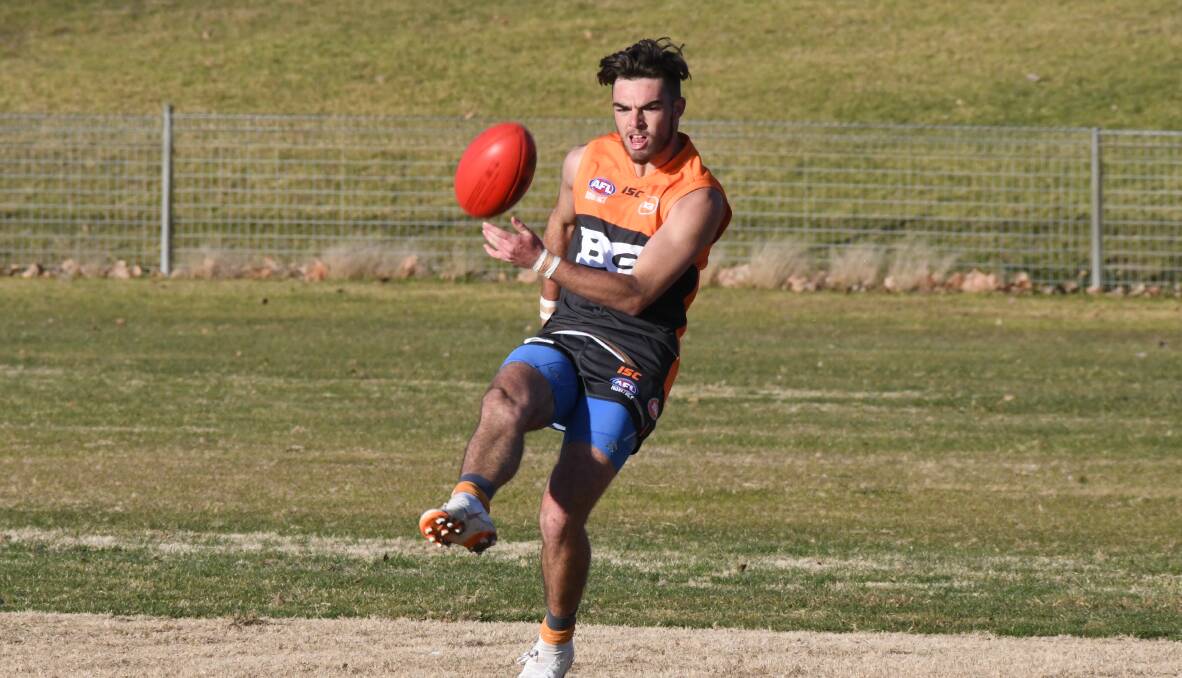 RETURNING: Bathurst Giants' Nic Broes gets a kick away last season. He'll be back with the Giants in 2020. Photo: CHRIS SEABROOK