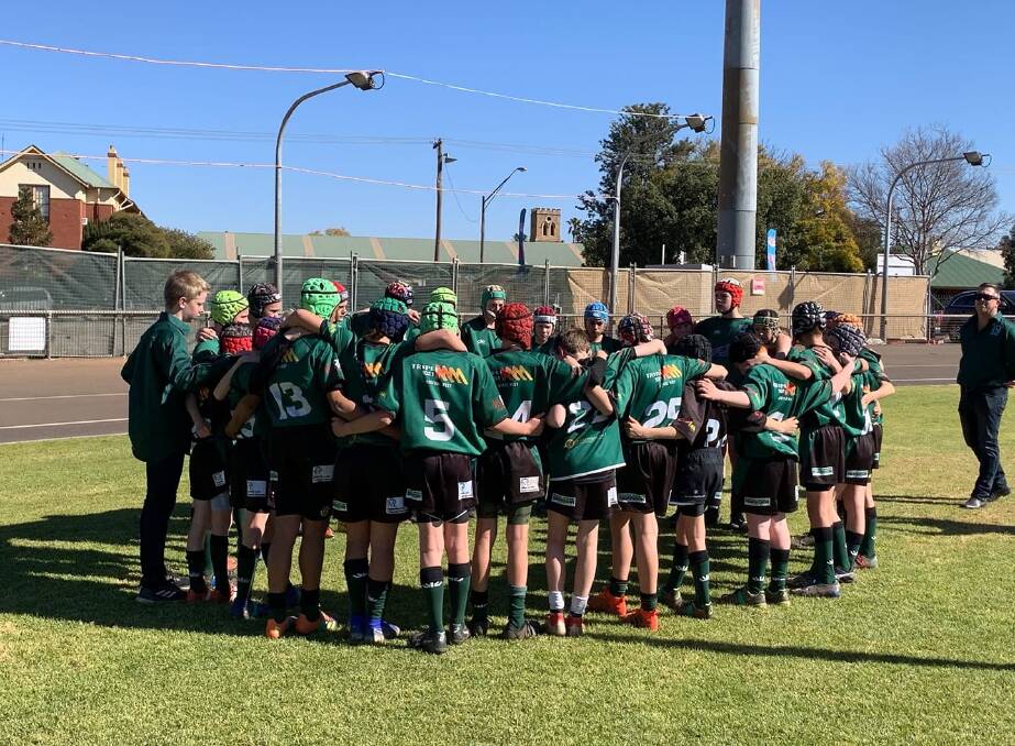 HUDDLE UP: The Emus under-13s in action in Dubbo on Saturday before their loss to City. They're hunting redemption, which starts this weekend when they take on Forbes. Photo: SUPPLIED. 