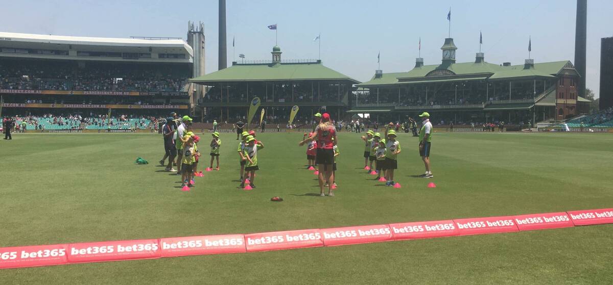 ON HALLOWED TURF: Orange's youngest cricketers lining up on the hallowed turf of the SCG. Photo: SUPPLIED. 
