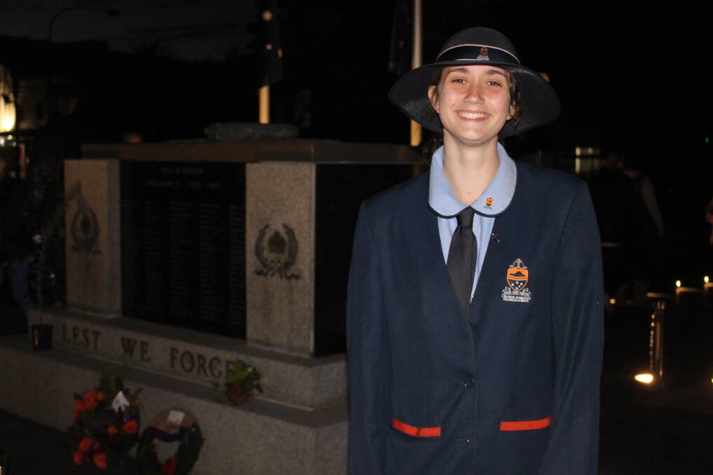 HONOURED: Orange Anglican Grammar School year 10 student Isabella Kane at the cenotaph after her performance. Photo: MAX STAINKAMPH