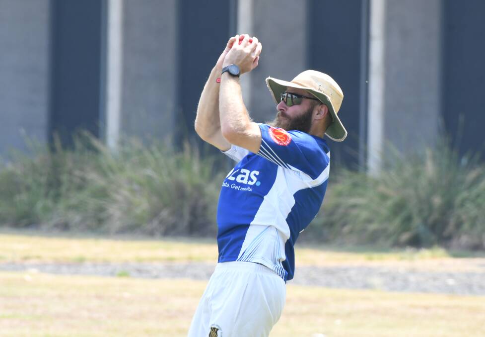 SAFE HANDS: Angus Le Lievre takes a catch on the boundary. Photo: ALEXANDER GRANT. 