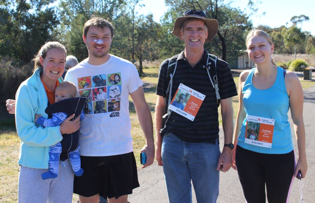 READY TO RUN: Amanda and Toby Dietiker, Nathan Gray, Graham Bailey and Sophie Fletcher at the starting line of Saturday's Walk for Water at Gosling Creek. Photo: MAX STAINKAMPH 0519MSwater1