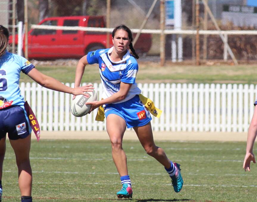 AMAZING ERIN: St Pat's fullback Erin Naden in action against Hawks in the major semi final at Wade Park. Photo: MAX STAINKAMPH