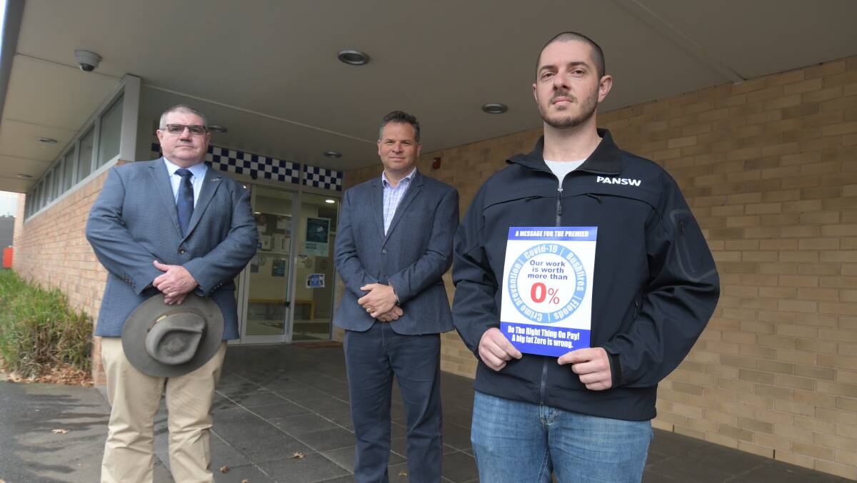 UN-FREEZE PAY: Member for Orange Phil Donato flanked by Police Association NSW president Tony King and Orange branch chair Adam Pifferelli. Photo: JUDE KEOGH